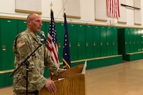 Alaska Army National Guard Command Sgt. Maj. Ryan Weimer delivers his remarks during a change of responsibility ceremony at the Alcantra Armory in Wasilla, Alaska, Aug. 1, 2022. Command Sgt. Maj. Julie Small relinquished responsibility as the 297th Regional Support Group's Senior Enlisted Leader to Weimer. (Alaska National Guard photo by Victoria Granado)