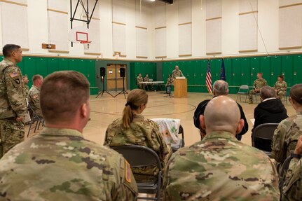 Alaska Army Guard Sgt. Seth LaCount sings the National Anthem and state song during a change of responsibility ceremony at the Alcantra Armory in Wasilla, Alaska, Aug. 1, 2022. Command Sgt. Maj. Julie Small relinquished responsibility as the 297th Regional Support Group's Senior Enlisted Leader to Command Sgt. Maj. Ryan Weimer. (Alaska National Guard photo by Victoria Granado)