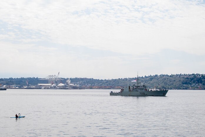 The Kingston-class coastal defence vessel HMCS Saskatoon (MM 709) transits into Seattle for Fleet Week, Aug. 1, 2022. Fleet Week Seattle is a time-honored celebration of the sea services and provides an opportunity for the citizens of Washington to meet Sailors, Marines and Coast Guardsmen, as well as witness firsthand the latest capabilities of today's maritime services. (U.S. Navy photo by Mass Communication Specialist 2nd Class Victoria Galbraith)