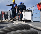 Sailors assigned to the guided-missile cruiser USS Lake Champlain (CG 57), handle mooring lines during sea and anchor detail, August 1 in support of Fleet Week Seattle 2022. Fleet Week Seattle is a time-honored celebration of the sea services that provides an opportunity for the citizens of Washington to meet Sailors, Marines and Coast Guardsmen, and witness the latest capabilities of today’s maritime services. (U.S. Navy photo by Mass Communication Specialist 2nd Class Aranza Valdez)