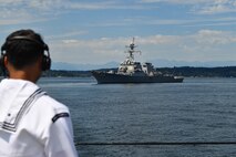 A Sailor stands watch as aft lookout aboard Ticonderoga-class guided-missile cruiser USS Lake Champlain (CG 57) during the parade of ships, August 1 in support of Fleet Week Seattle 2022. Fleet Week Seattle is a time-honored celebration of the sea services that provides an opportunity for the citizens of Washington to meet Sailors, Marines and Coast Guardsmen, and witness the latest capabilities of today’s maritime services. (U.S. Navy photo by Mass Communication Specialist 2nd Class Aranza Valdez)