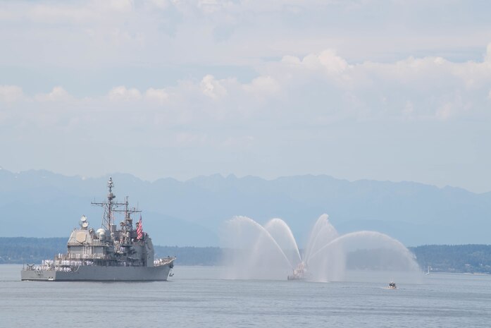 The Arleigh Burke-class guided missile destroyer USS John Paul Jones (DDG 53) arrives in Seattle for Fleet Week, Aug. 1, 2022.