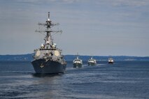 The guided-missile destroyer USS John Paul Jones (DDG 53), the Royal Canadian Navy Kingston-class coastal defence vessels HMCS Saskatoon (MM 709) and Yellowknife (MM 706), and the U.S. Coast Guard cutter Henry Blake (WLM 563) transit during the parade of ships, August 1 in support of Fleet Week Seattle 2022.