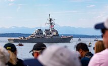 The Arleigh Burke-class guided-missile destroyer USS John Paul Jones (DDG 53) participates in the parade of ships during Fleet Week Seattle, Aug. 1, 2022.