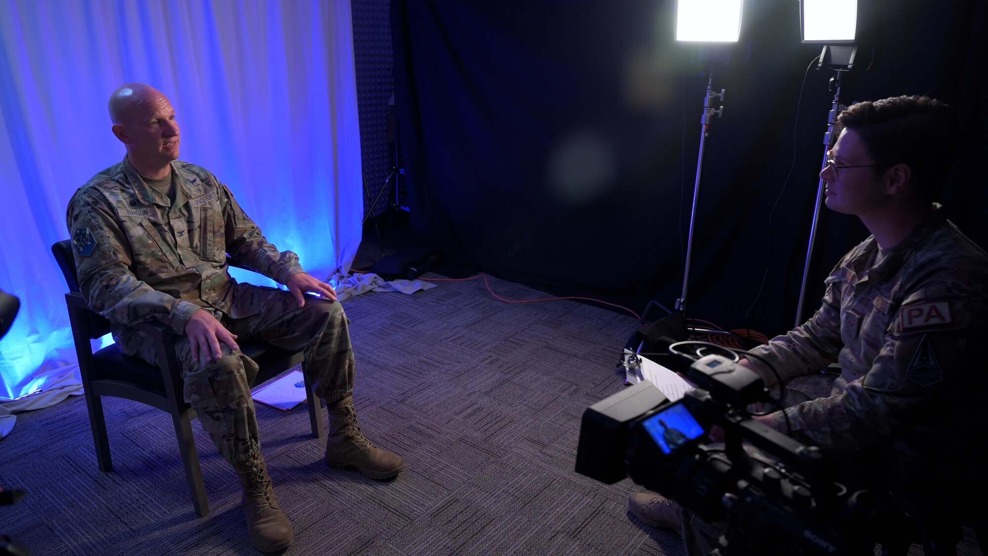 U.S. Air Force Airman 1st Class Aaron Edwards, Space Base Delta 1 public affairs specialist, interviews U.S. Space Force Col. David Hanson, Space Base Delta 1 commander.