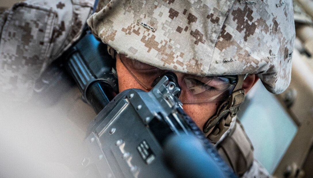 U.S. Marine Corps Cpl. Alex Maciel, a motor transport operator with Marine Wing Support Squadron 473, 4th Marine Aircraft Wing, Marine Forces Reserve, sets security with a M240 medium machine gun on Range 205A during Integrated Training Exercise 4-22 at Marine Corps Air-Ground Combat Center, Twentynine Palms, Calif., July 29, 2022. The mobile operations course challenges supporting elements of the Marine Air-Ground Task Force to respond to contact while delivering logistical supplies to other elements of the MAGTF. ITX is designed to provide large forces the opportunity to command and control their Marines through a live-fire program incorporating every element of the MAGTF. (U.S. Marine Corps photo by Sgt. Matthew Teutsch)