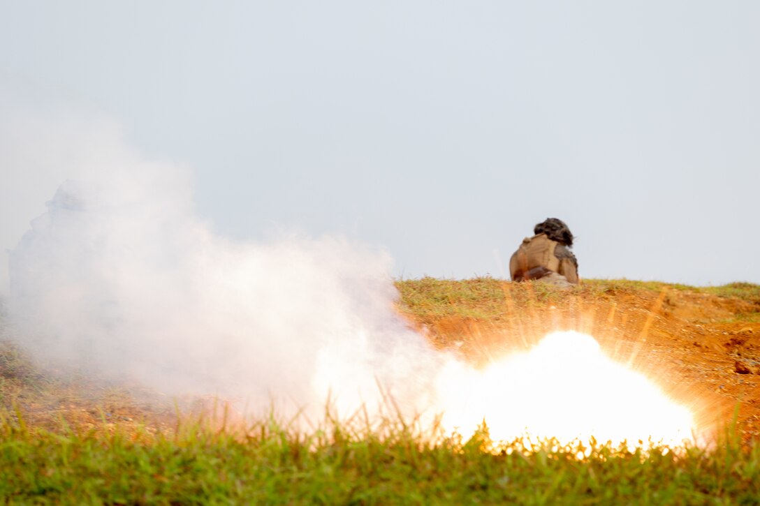 U.S. Marines with 3d Battalion, 3d Marines conduct squad attacks during a live-fire range at Camp Hansen, Okinawa, Japan, July 28, 2022. This training improved the Marines’ proficiency at the tactical level and developed small-unit leadership. 3/3 is forward deployed in the Indo-Pacific under 4th Marines, 3d Marine Division as part of the Unit Deployment Program. (U.S. Marine Corps photo by Pfc. Jaylen Davis)