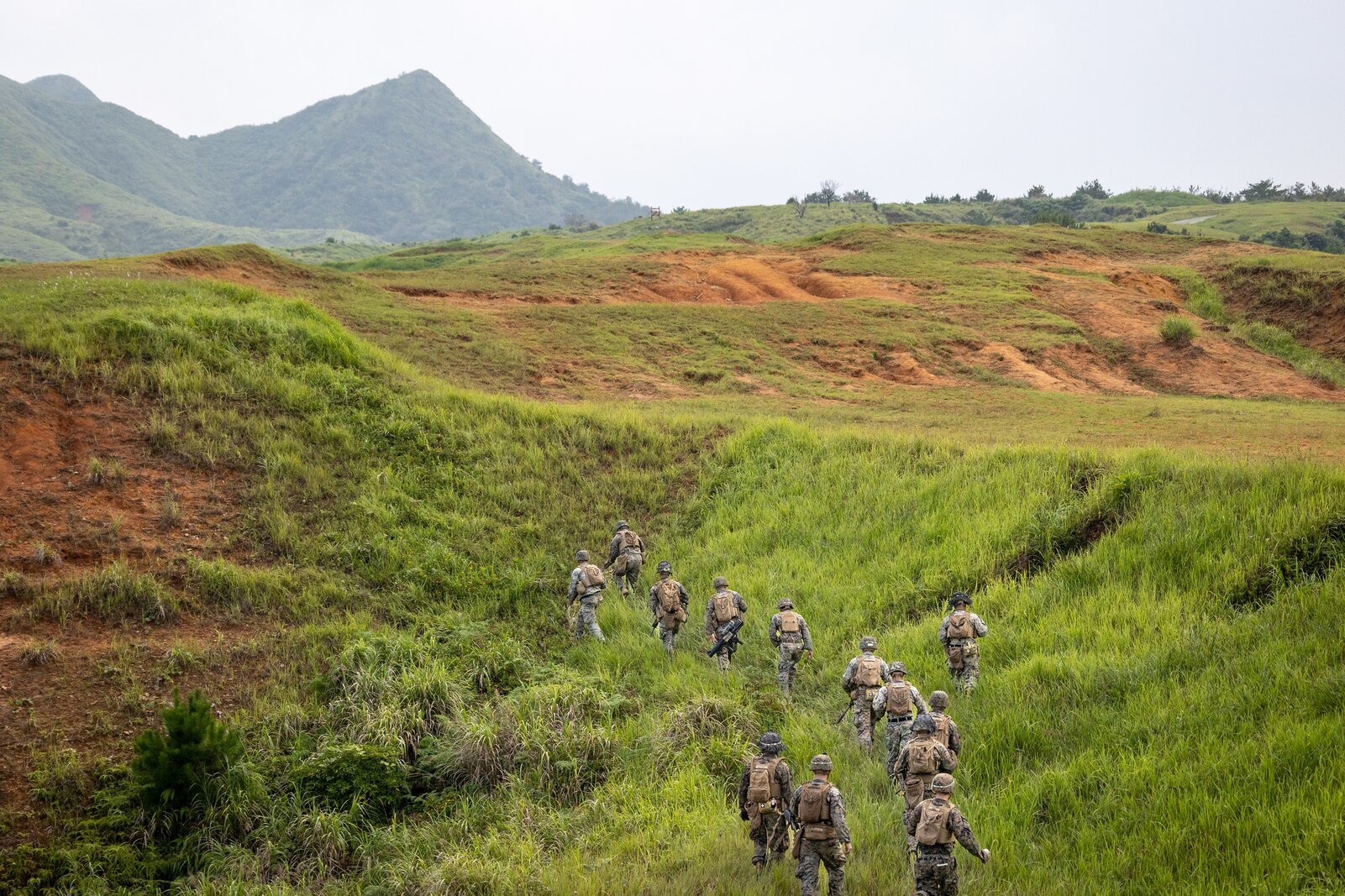 U.S. Marines with 3d Battalion, 3d Marines conduct squad attacks during a live-fire range at Camp Hansen, Okinawa, Japan, July 28, 2022. This training improved the Marines’ proficiency at the tactical level and developed small-unit leadership. 3/3 is forward deployed in the Indo-Pacific under 4th Marines, 3d Marine Division as part of the Unit Deployment Program. (U.S. Marine Corps photo by Sgt. Micha Pierce)