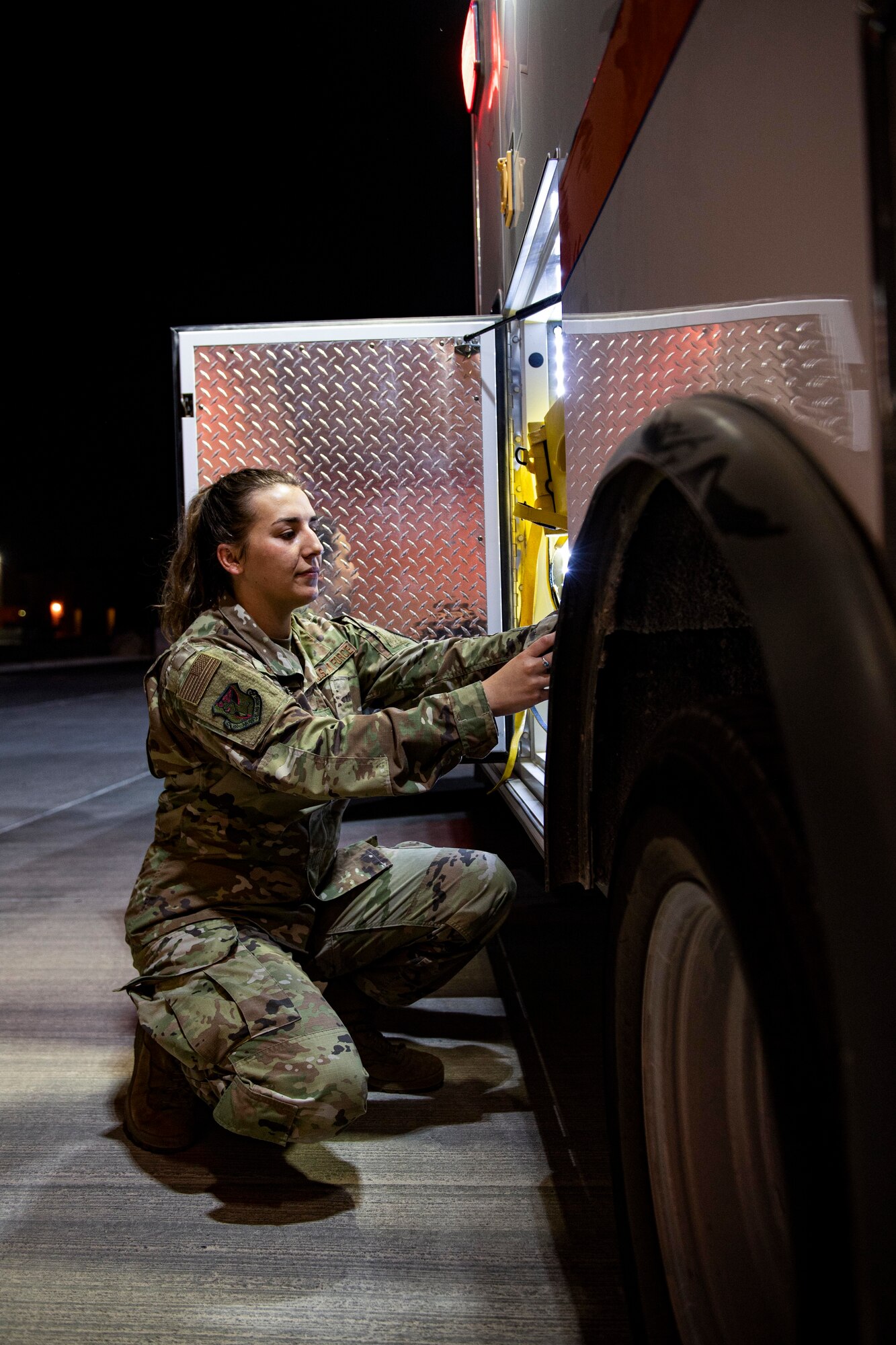 U.S. Air Force Staff Sgt. Skylar Medrano, 379th Expeditionary Medical Group, takes inventory of medical supplies on board an ambulance July 25, 2022 at Al Udeid Air Base, Qatar. Medics stand by 24 hours a day to render first aid and rapid transportation to patients. (U.S. Air National Guard photo by Master Sgt. Michael J. Kelly)