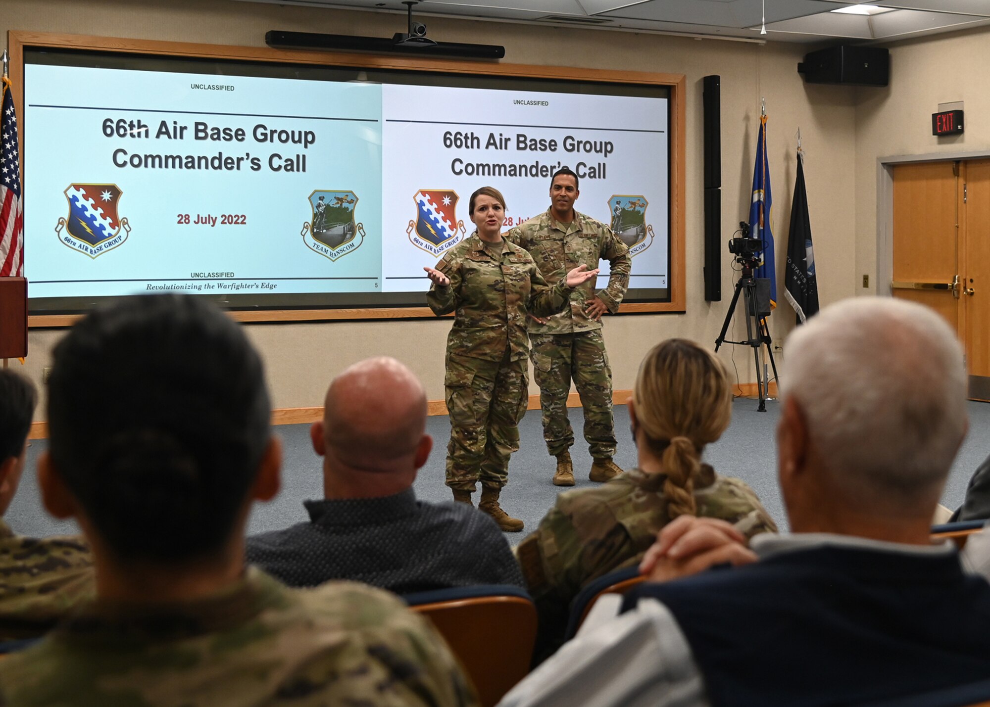 Airmen speak to employees