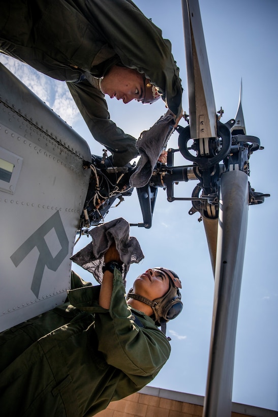 HMLA-775 conducts pre-flight maintenance