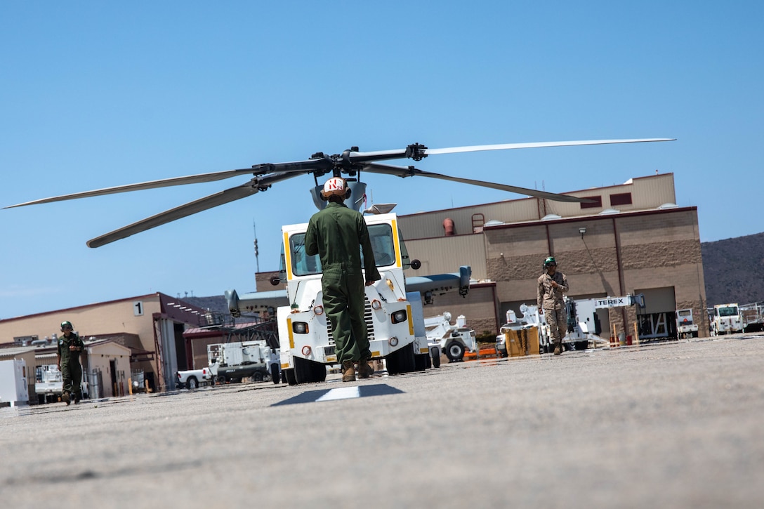 HMLA-775 conducts pre-flight maintenance