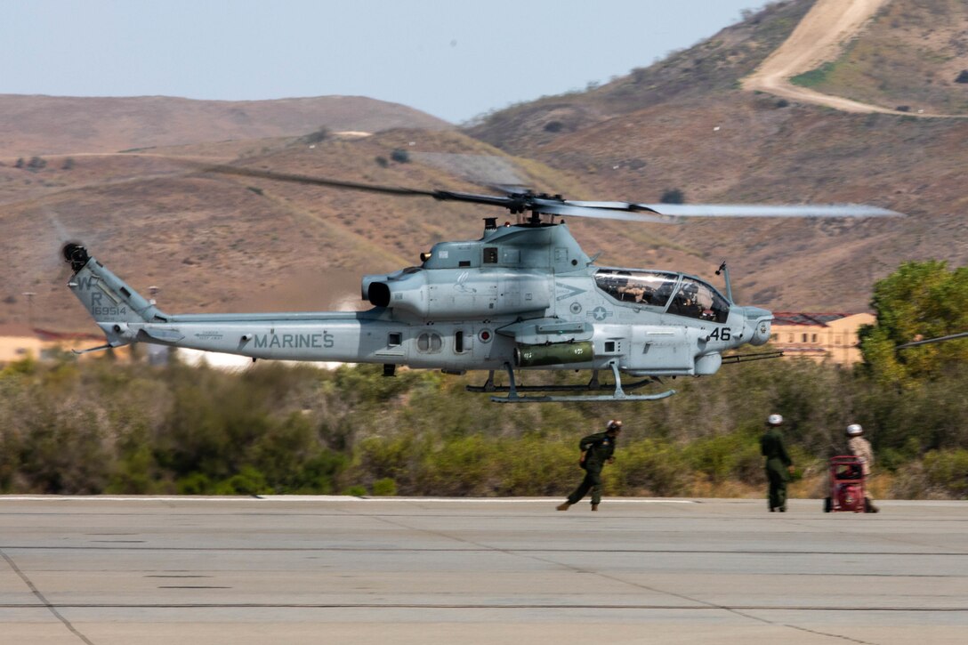 HMLA-775 conducts pre-flight maintenance