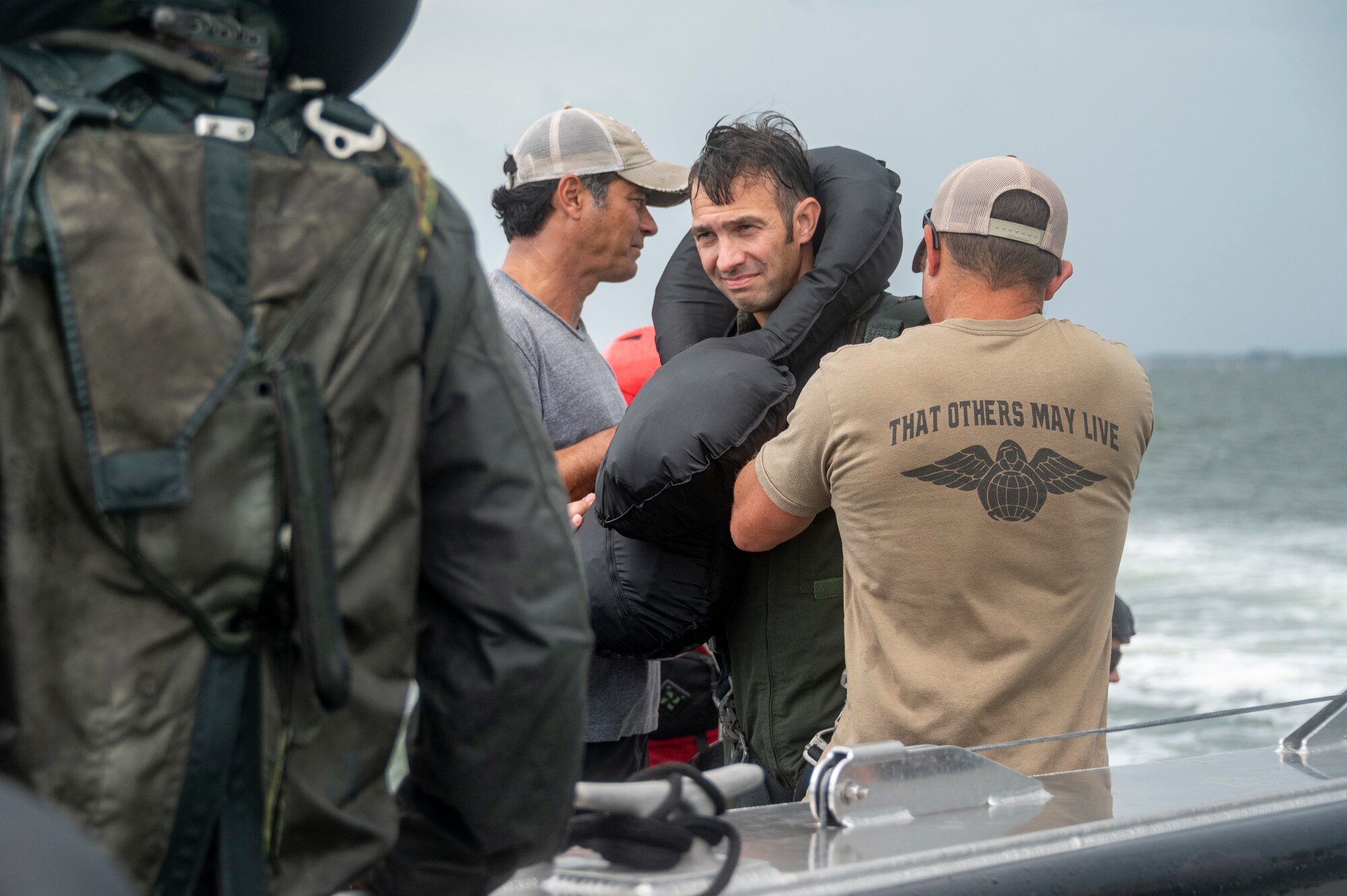 Photo of Airmen in life jacket.