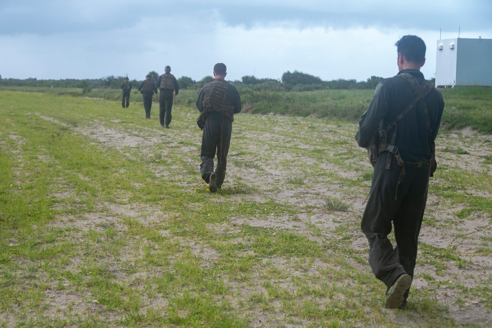 Photo of Airmen walking.