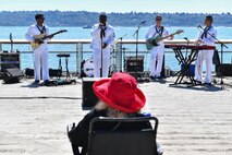 Members of Navy Band Northwest perform a live show for onlookers at pier 62, August 2 in support of Fleet Week Seattle 2022. Fleet Week Seattle is a time-honored celebration of the sea services that provides an opportunity for the citizens of Washington to meet Sailors, Marines and Coast Guardsmen, and witness the latest capabilities of today’s maritime services. (U.S. Navy photo by Mass Communication Specialist 2nd Class Aranza Valdez)