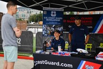 Coast Guardsmen at pier 62, speak with the public about naval heritage August 2 in support of Fleet Week Seattle 2022. Fleet Week Seattle is a time-honored celebration of the sea services that provides an opportunity for the citizens of Washington to meet Sailors, Marines and Coast Guardsmen, and witness the latest capabilities of today’s maritime services. (U.S. Navy photo by Mass Communication Specialist 2nd Class Aranza Valdez)