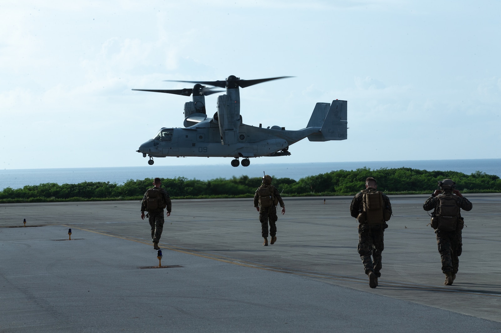 U.S. Marines with 3d Battalion, 3d Marines prepare to board an MV-22 Osprey after conducting close air support (CAS) drills on Ie Shima, Okinawa, Japan, July 14, 2022. 3/3’s Joint Terminal Aircraft Controllers conducted CAS training to hone their proficiency in coordinating precision fires from aircraft. 3/3 is forward deployed in the Indo-Pacific under 4th Marines, 3d Marine Division as part of the Unit Deployment Program. (U.S. Marine Corps photo by Lance Cpl. Michael Taggart)