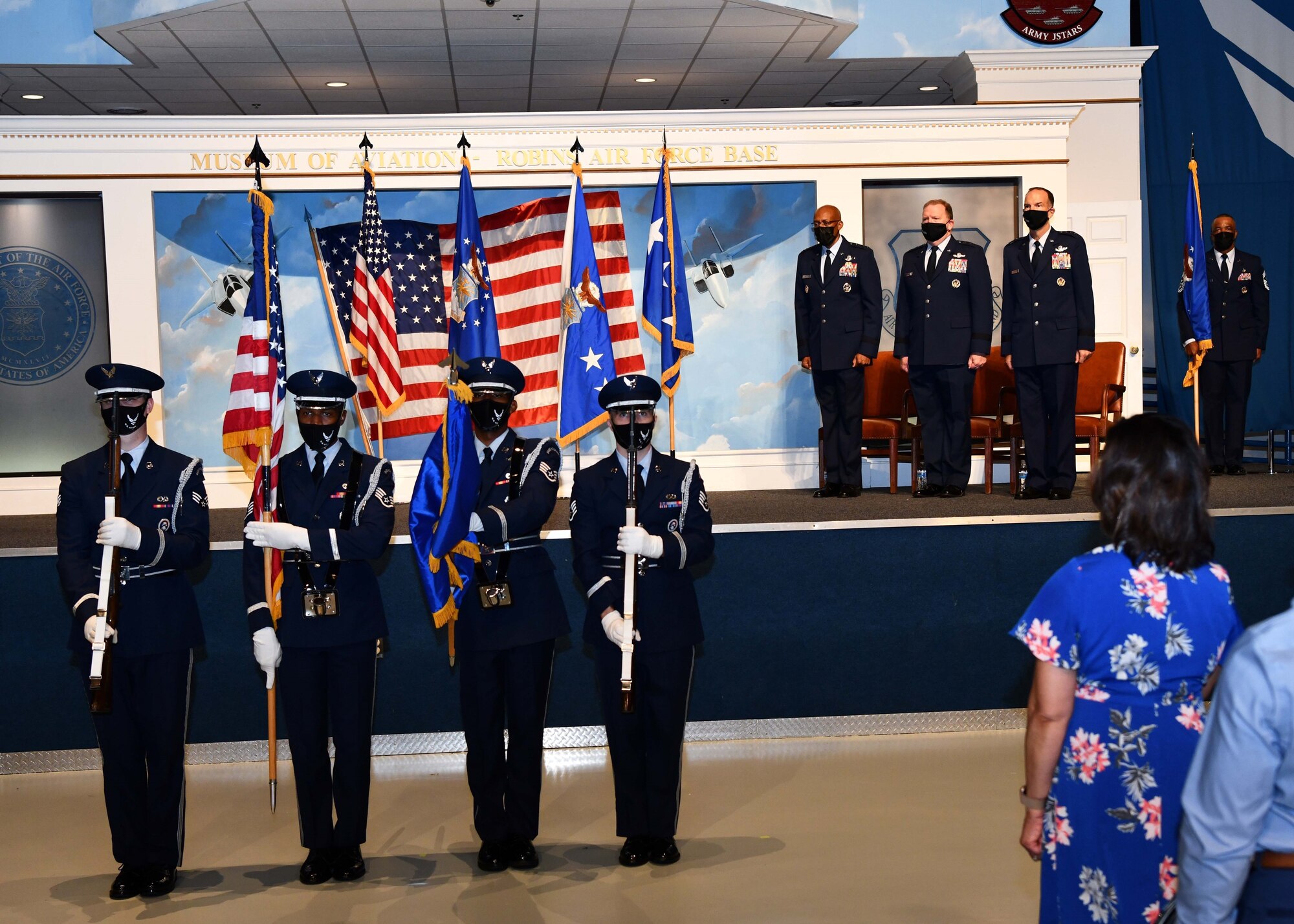 Photo of honor guard presenting the colors during a change of command ceremony