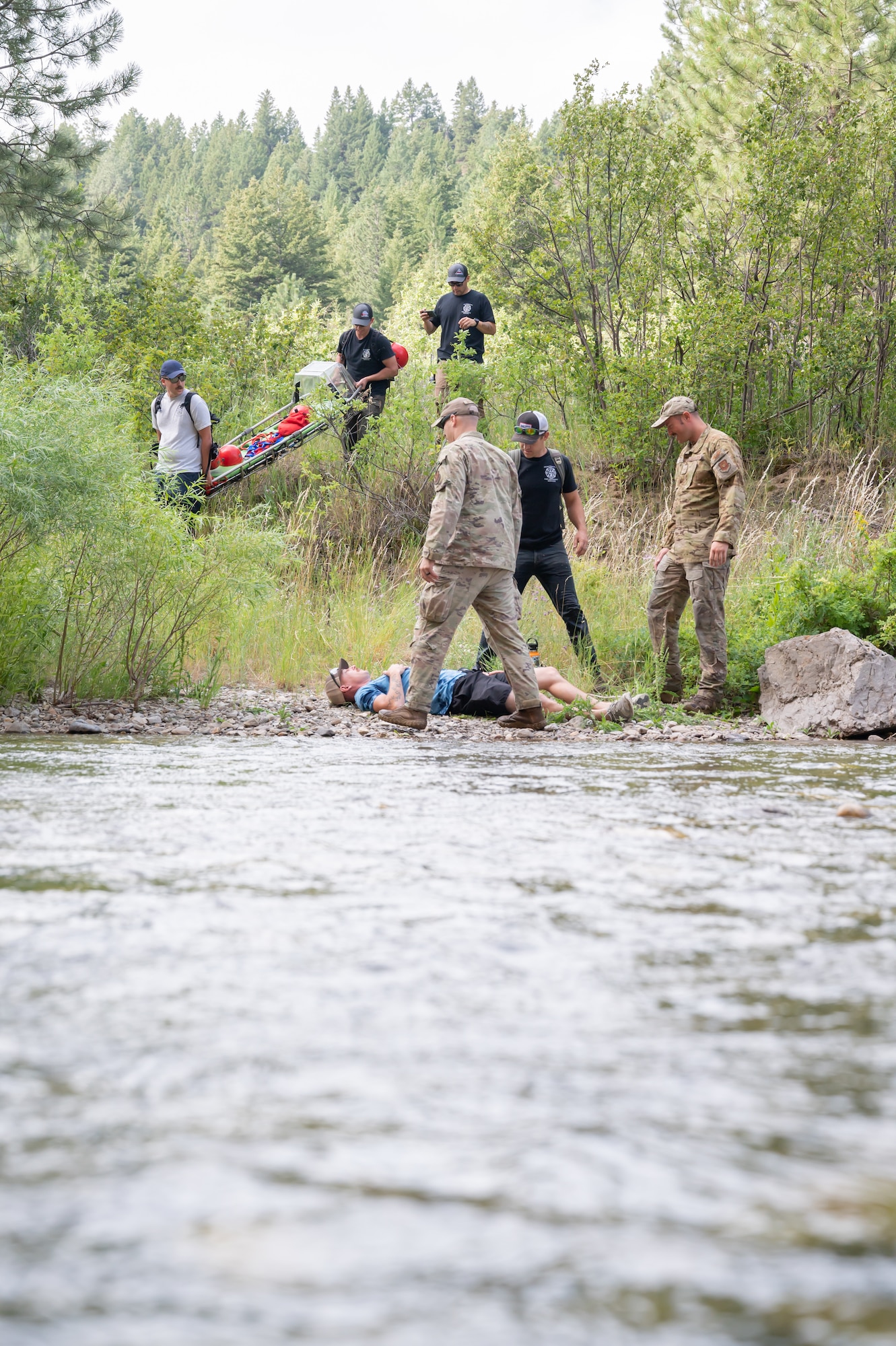 Malmstrom Air Force Base Airmen respond to a simulated injured hiker during a search and rescue exercise Aug. 2, 2022, in Sluice Boxes State Park, Mont.