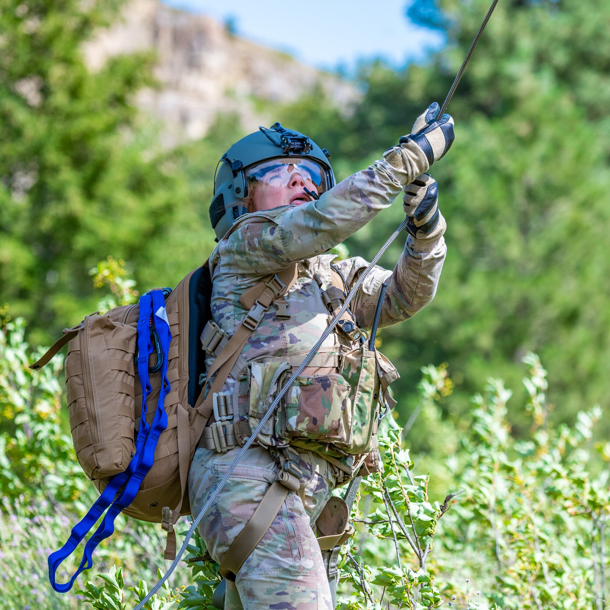 Maj. Joyanne Tesei, 341st Medical Group flight doctor, holds the rope attached to the stokes litter during a search and rescue exercise August 3, 2022, in Sluice Boxes State Park.