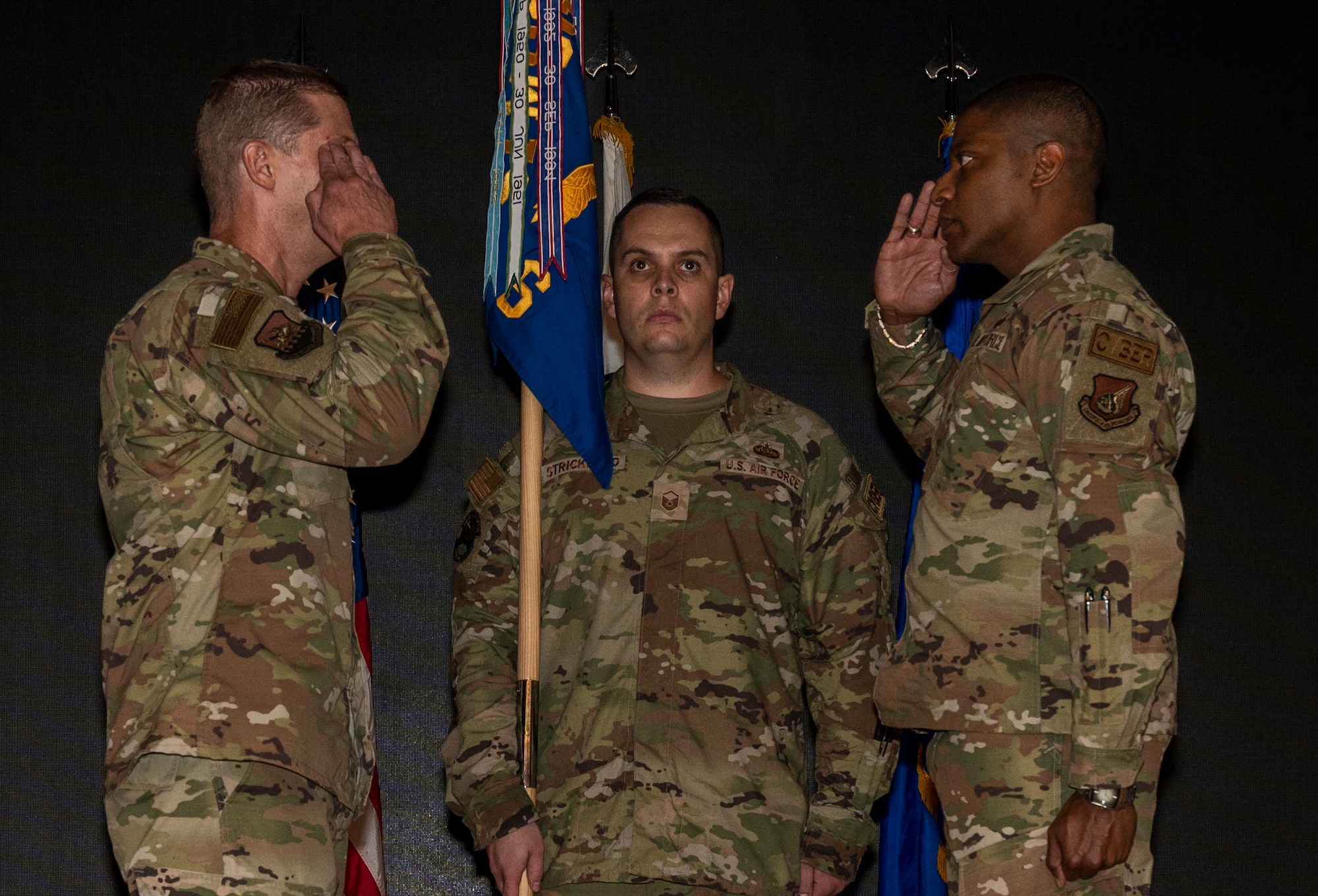 Col. Kyle Grygo, 51st Mission Support Group commander, receives a salute from Lt. Col. Michael Newson, 51st Communications Squadron newly appointed commander, during an assumption of command ceremony at Osan Air Base, Republic of Korea, Aug. 2, 2022.