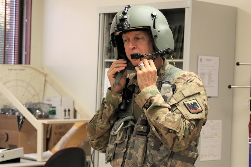 U.S. Army Gen. Daniel R. Hokanson, Chief of the National Guard Bureau, visits the Eastern Army National Guard Aviation Training Site to receive an orientation on the new UH-60V Black Hawk helicopters and take one for a quick flight.