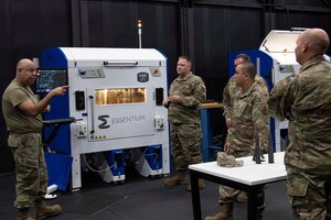 Master Sgt. Carlos Gill, the non-commissioned officer in charge of metals technology for the 149th Fighter Wing, instructs fellow Gunfighters on 3D printing techniques at the 149th FW “3D Printing Center of Excellence” on Joint Base San Antonio-Lackland, Texas, 12 Dec. 2021. (U.S. Air National Guard Photo by Staff Sgt. Katie Schultz)