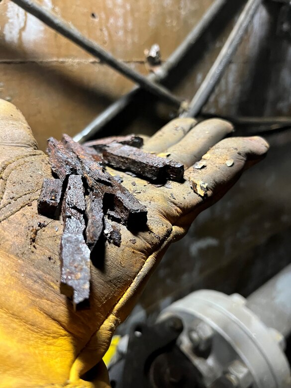 Mechanics replace old, rusted pipes for hydraulics system