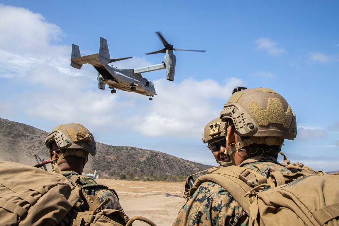 U.S. Marines with India Company, 3rd Battalion, 5th Marine Regiment, 1st Marine Division, prepare to board an MV-22B Osprey during Readiness Exercise 22.2 at Marine Corps Base Camp Pendleton, California, July 26, 2022. The purpose of REDEX 22.2 is to validate worldwide crisis-response capabilities and demonstrate deployment readiness. (U.S. Marine Corps photo by Cpl. Harris)