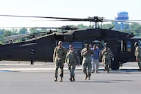 U.S. Army Gen. Daniel R. Hokanson, Chief of the National Guard Bureau, visits the Eastern Army National Guard Aviation Training Site to receive an orientation on the new UH-60V Black Hawk helicopters and take one for a quick flight.