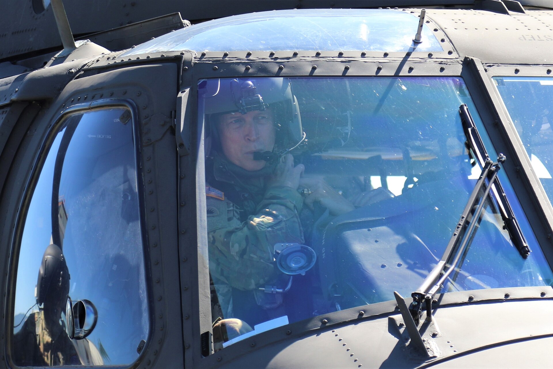 U.S. Army Gen. Daniel R. Hokanson, Chief of the National Guard Bureau, visits the Eastern Army National Guard Aviation Training Site to receive an orientation on the new UH-60V Black Hawk helicopters and take one for a quick flight.