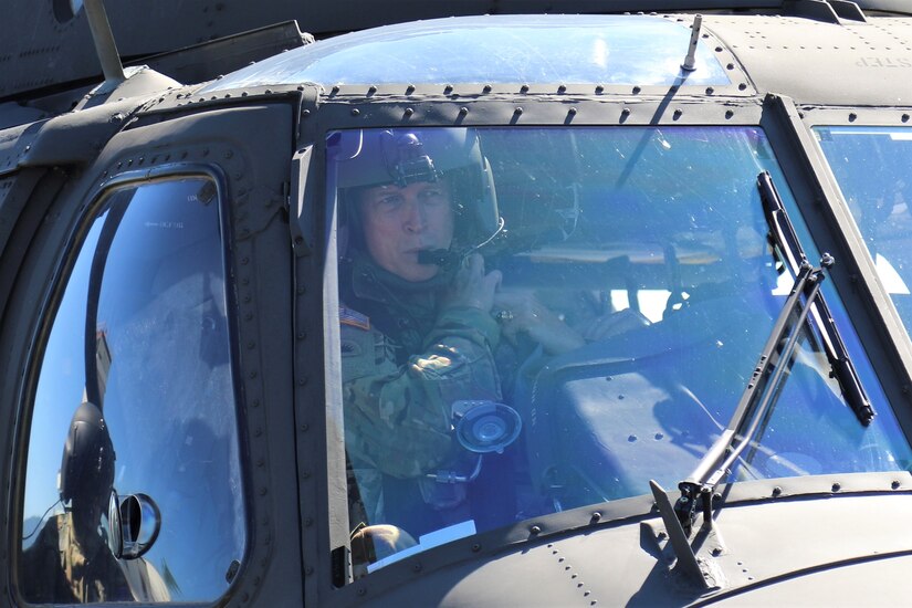 U.S. Army Gen. Daniel R. Hokanson, Chief of the National Guard Bureau, visits the Eastern Army National Guard Aviation Training Site to receive an orientation on the new UH-60V Black Hawk helicopters and take one for a quick flight.