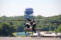 U.S. Army Gen. Daniel R. Hokanson, Chief of the National Guard Bureau, visits the Eastern Army National Guard Aviation Training Site to receive an orientation on the new UH-60V Black Hawk helicopters and take one for a quick flight.