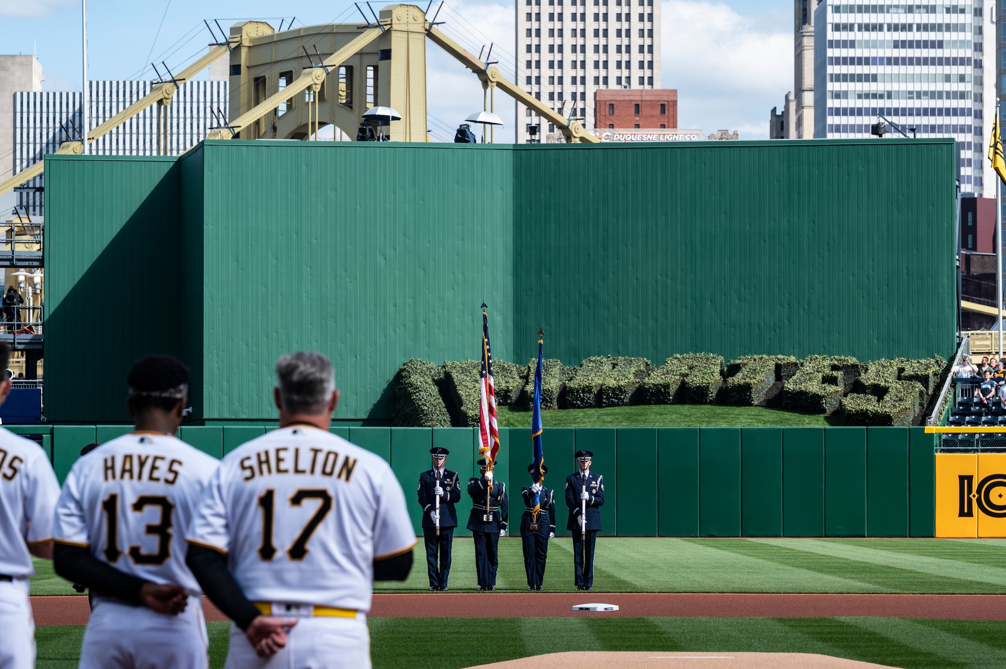 Airmen assigned to the 911th Airlift Wing Honor Guard present the colors during the singing of the National Anthem before the Pittsburgh Pirates home opener at PNC Park in Pittsburgh, Pennsylvania, April 12, 2022.
