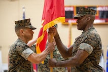 U.S. Marine Corps Lt. Gen. Michael E. Langley, right, the outgoing commander of Fleet Marine Force, Atlantic (FMFLANT), Marine Forces Command (MARFORCOM), Marine Forces Northern Command (MARFOR NORTHCOM), relinquishes command to Brig. Gen. John F. Kelliher III, left, the incoming FMFLANT, MARFORCOM, MARFOR NORTHCOM commanding general, during a succession of command ceremony at Camp Elmore, Virginia, Aug. 4, 2022. The succession of command ceremony is a military tradition that signifies all responsibilities and authorities being transferred from one commander to another. The new commanding general will proceed to execute the mission of FMFLANT, MARFORCOM and MARFOR NORTHCOM in provisioning joint capable Marine Corps forces, direct deployment planning and execution of Service-retained operating forces in support of the combatant commander. (U.S. Marine Corps photo by Lance Cpl. Angel Alvarado)
