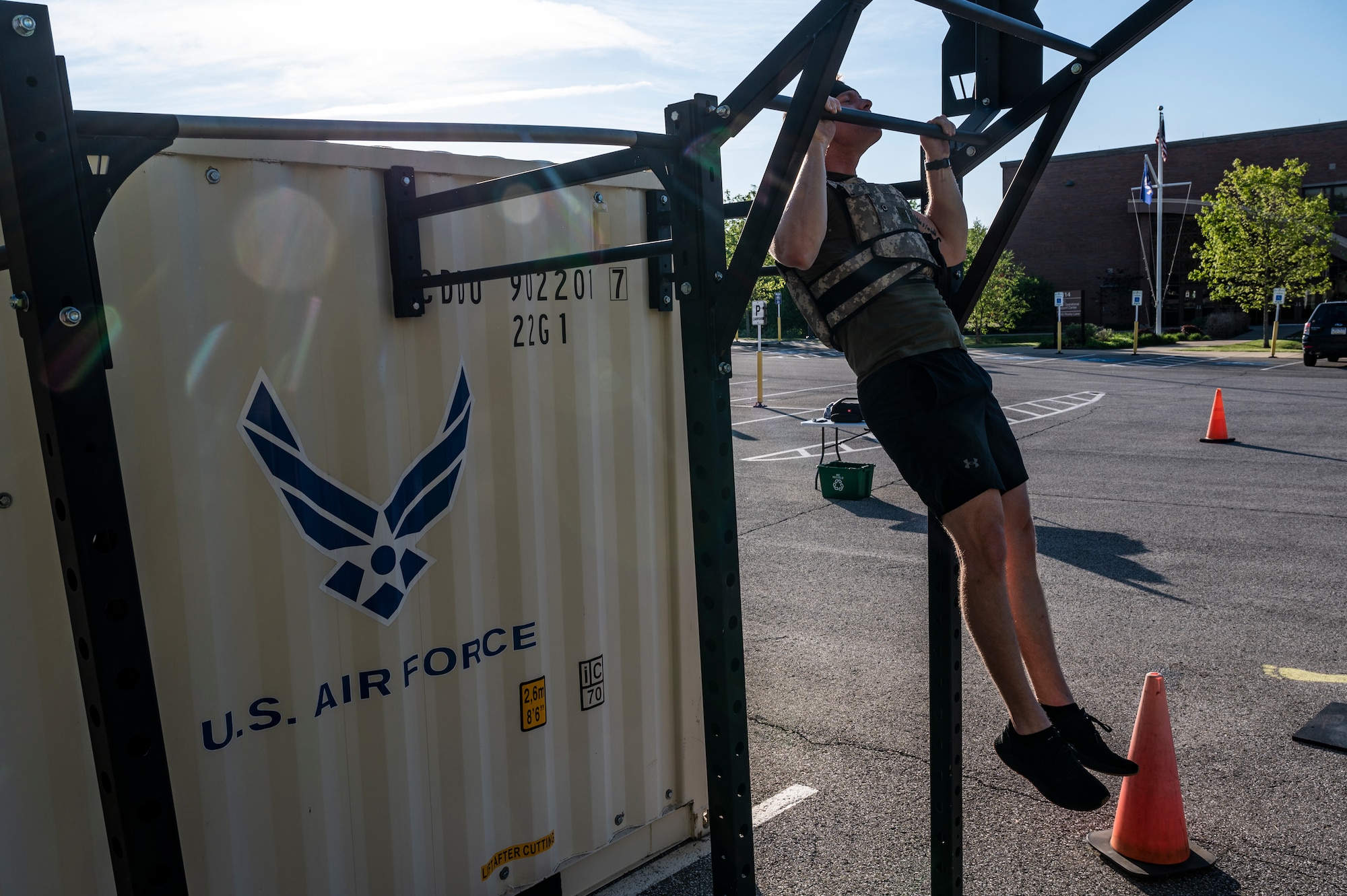 Master Sgt. David Novak, 911th Operations Support Squadron combat crew communications technician, performs a pull-up as part of the Murph Challenge at the Pittsburgh International Airport Air Reserve Station, Pennsylvania, May 18, 2022.