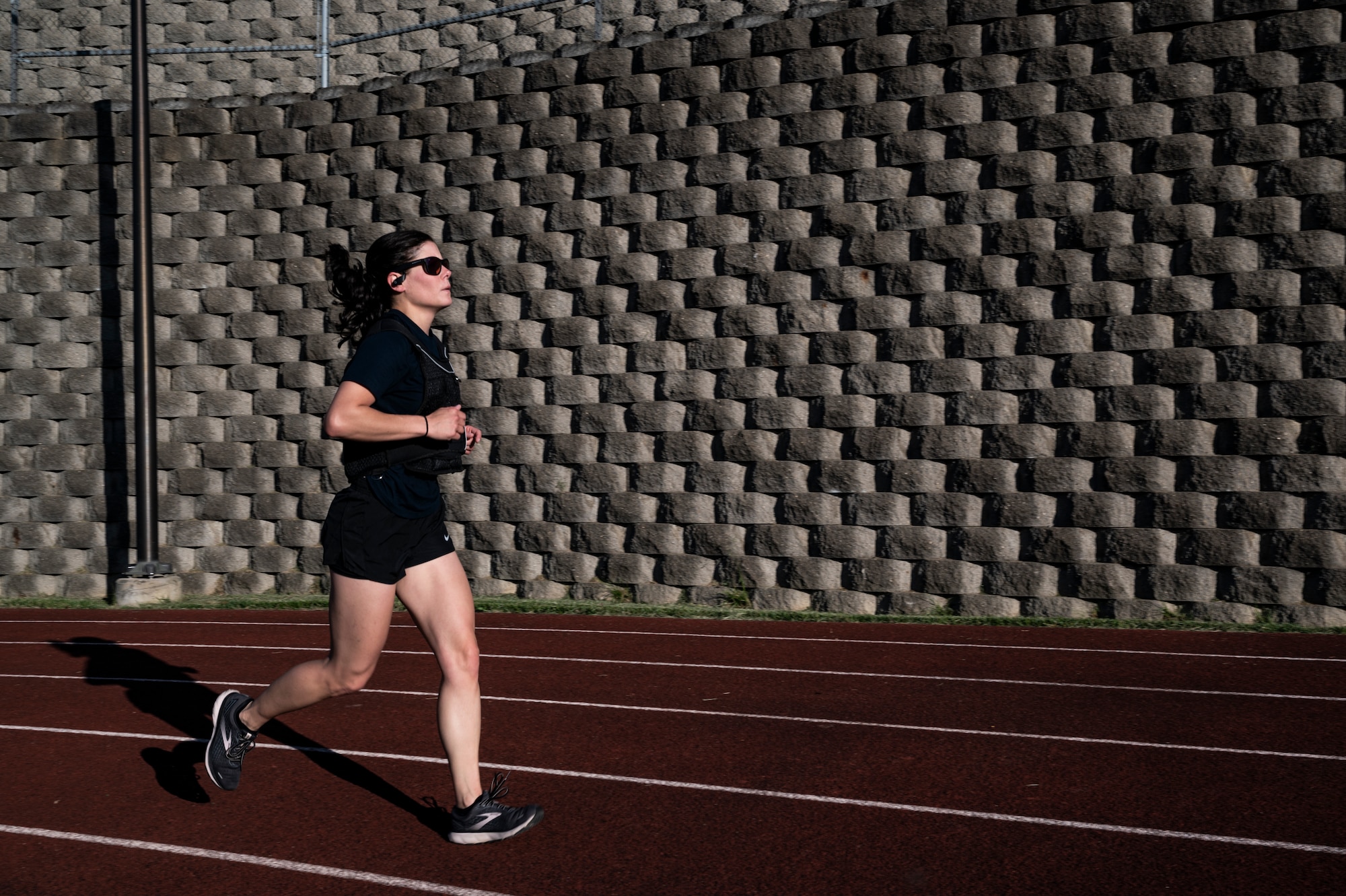 Tech Sgt. Shelly Pavcik, 911th Maintenance Squadron aircraft structural technician, performs a mile run as part of the Murph Challenge at the Pittsburgh International Airport Air Reserve Station, Pennsylvania, May 18, 2022.