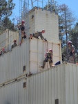 Colorado National Guard members of the Chemical, Biological, Radiological and Nuclear Enhanced Response Force Package rappel down a structure to practice search and rescue techniques. The team performed their external evaluation at Camp Rilea, Astoria, Oregon, July 9-17, 2022. 
(U.S. Air National Guard stock photo)
