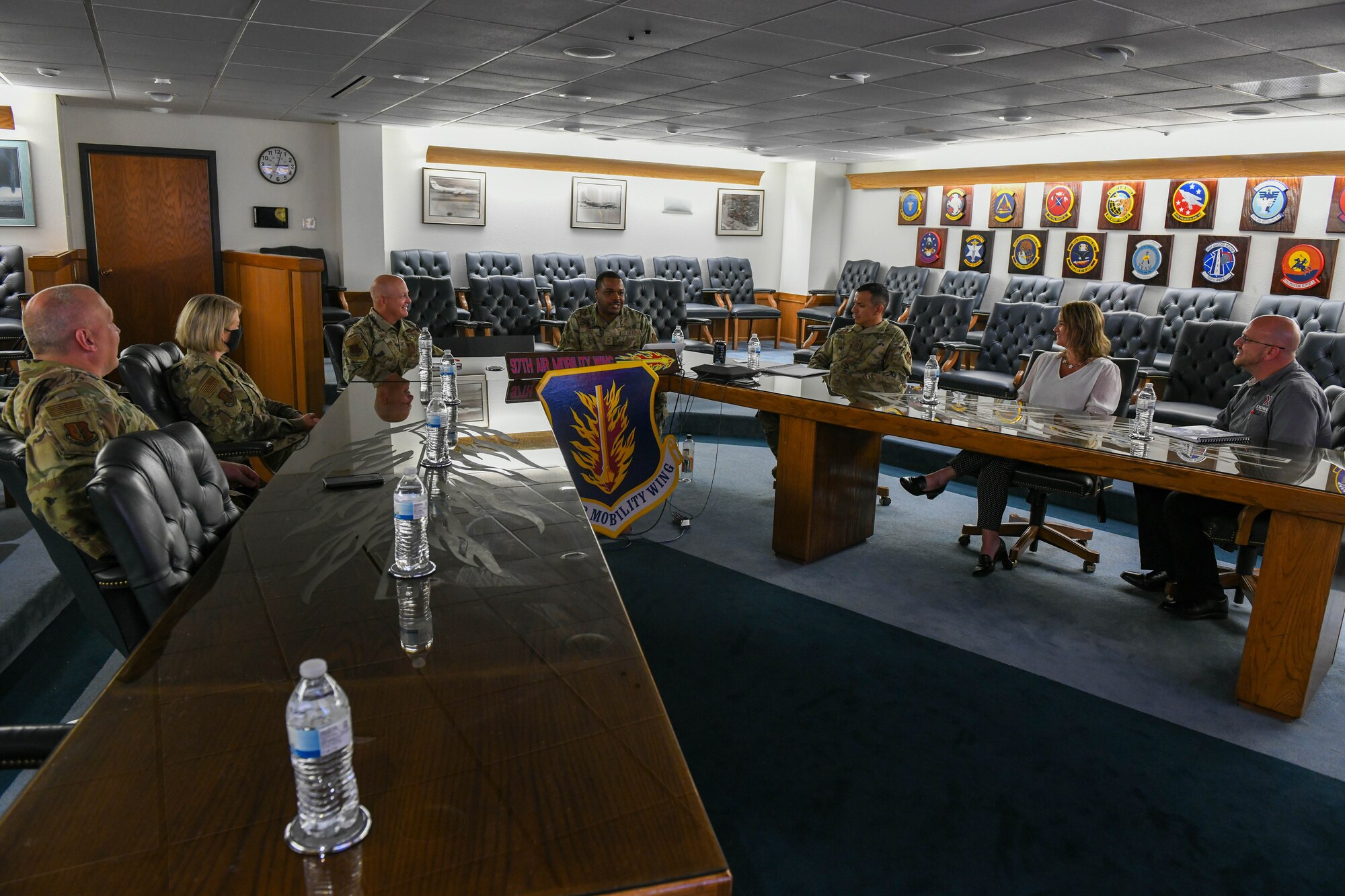 Chief Master Sgt. Kevin Osby, senior enlisted advisor for the Army and Air Force Exchange Service (AAFES), discusses with 97th Air Mobility Wing and Exchange service leaders at Altus Air Force Base, Oklahoma, August 3, 2022. Osby’s visit was focused on how AAFES can improve the quality of life for the Altus community. (U.S. Air Force photo by Airman 1st Class Trenton Jancze)