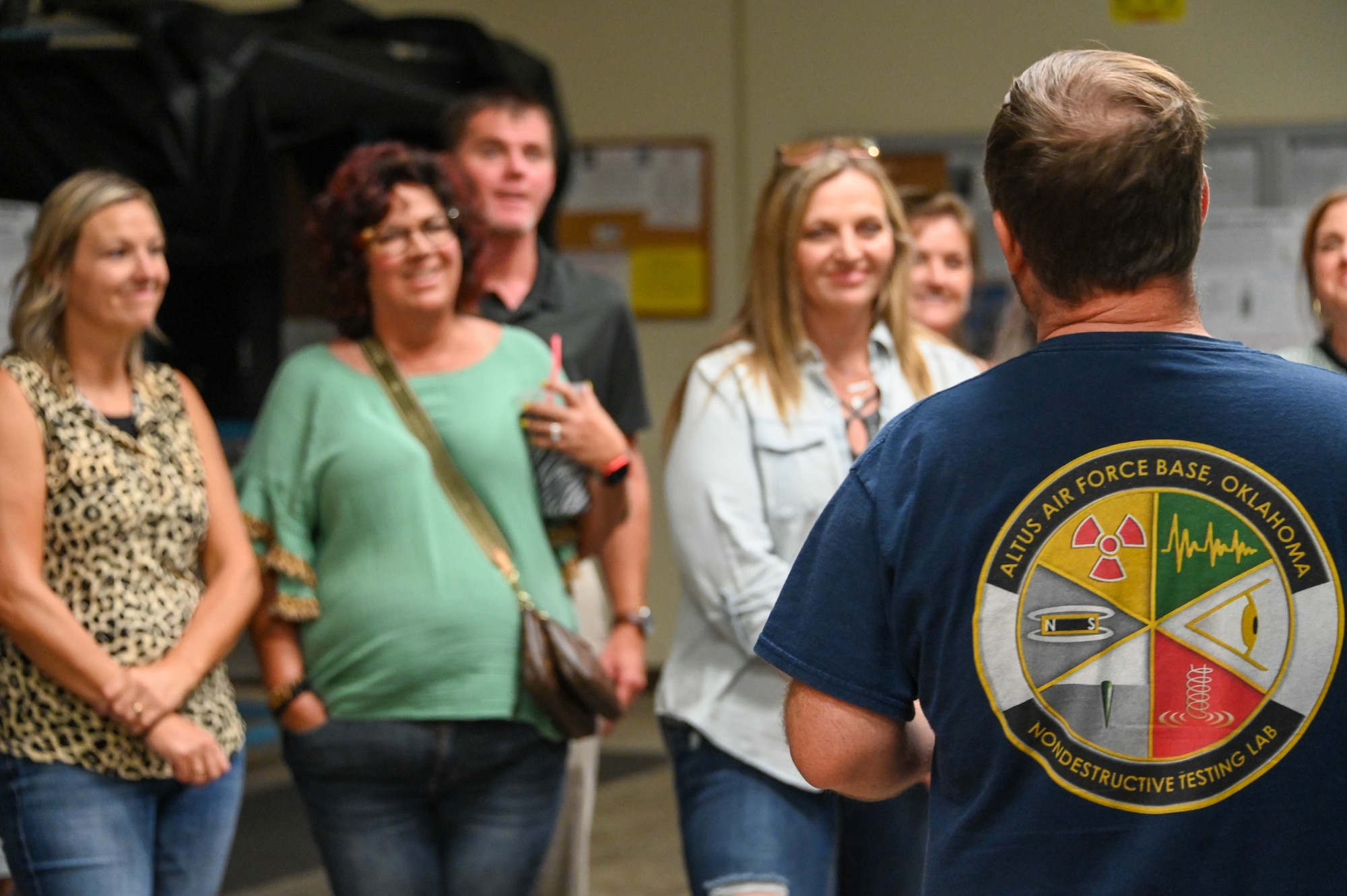 Adrian Leal, 97th Maintenance Squadron Precision Management Equipment Laboratory (PMEL) technician, performs a demonstration for local teachers at Altus Air Force Base (AAFB), Oklahoma, Aug. 2, 2022. The teachers stopped at the PMEL to learn more about the science, technology, engineering, and mathematics aspect of AAFB. (U.S. Air Force photo Senior Airman Kayla Christenson)