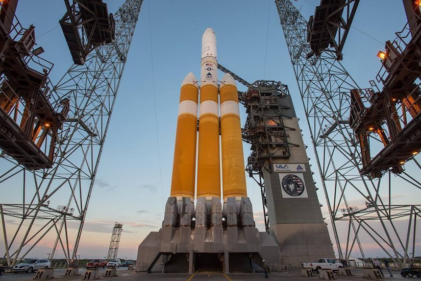 A rocket sits on a launch pad.