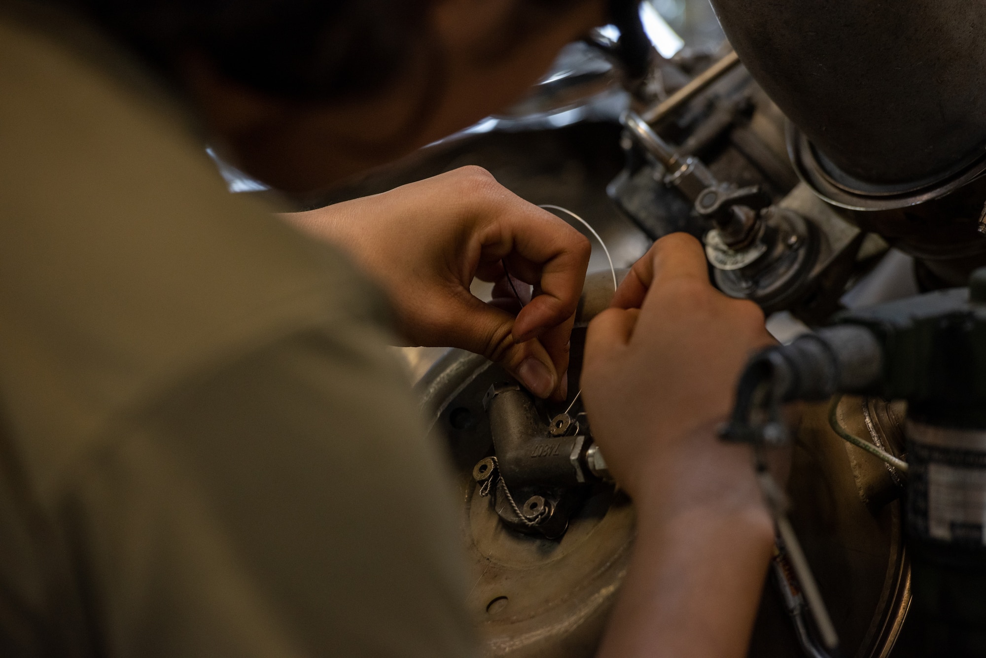 Airman inspecting equipment