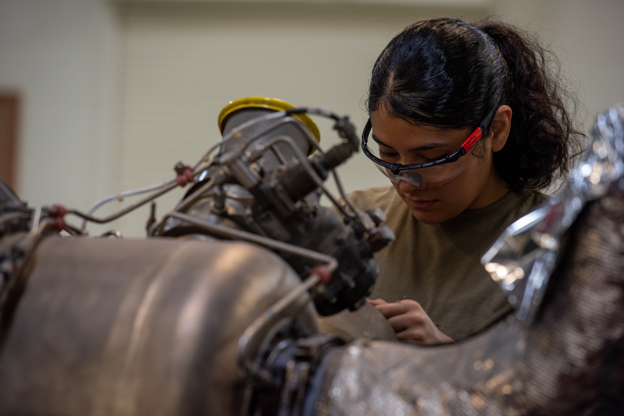 Airman inspecting equipment