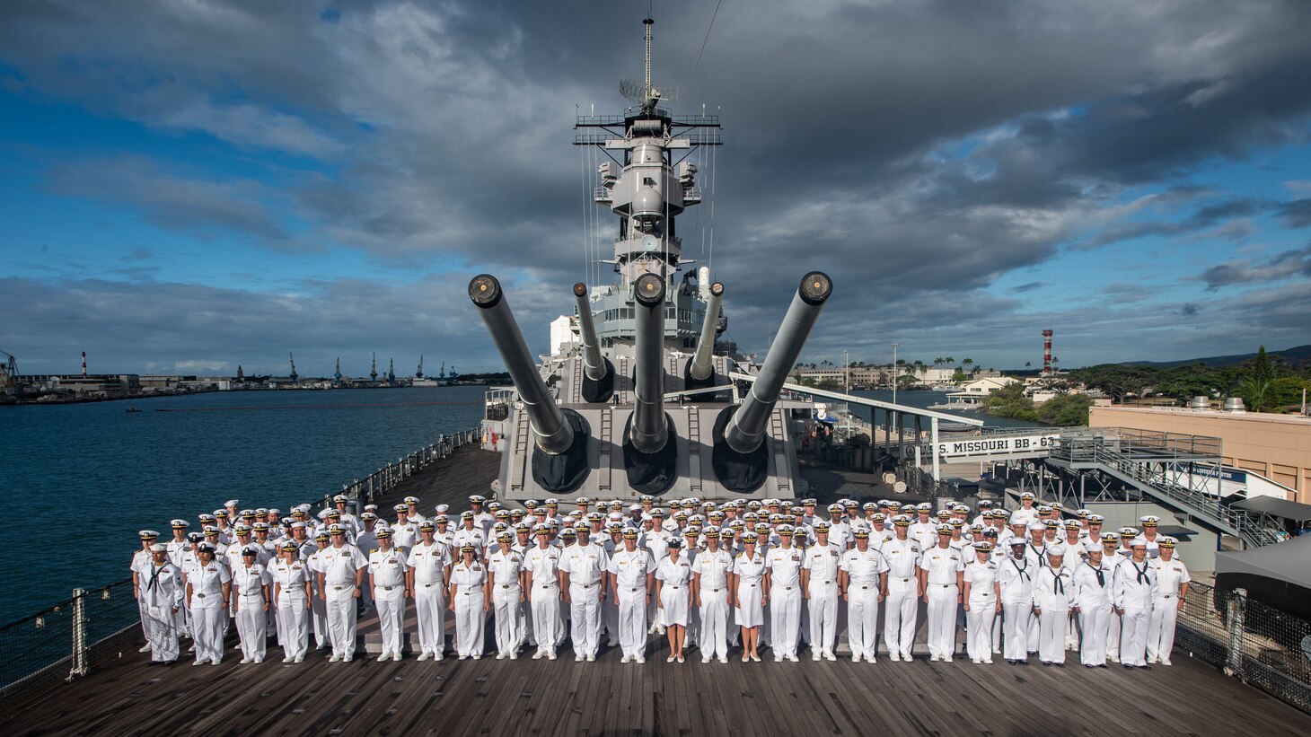 PEARL HARBOR, Hawaii (July 21, 2022) –U.S. Navy reserve Sailors pose for a group photo during Rim of the Pacific (RIMPAC) 2022, July 21. Twenty-six nations, 38 ships, three submarines, more than 170 aircraft and 25,000 personnel are participating in RIMPAC from June 29 to Aug. 4 in and around the Hawaiian Islands and Southern California. The world's largest international maritime exercise, RIMPAC provides a unique training opportunity while fostering and sustaining cooperative relationships among participants critical to ensuring the safety of sea lanes and security on the world's oceans. RIMPAC 2022 is the 28th exercise in the series that began in 1971. (U.S. Navy video by Mass Communications Specialist 3rd Class Dylan Lavin)