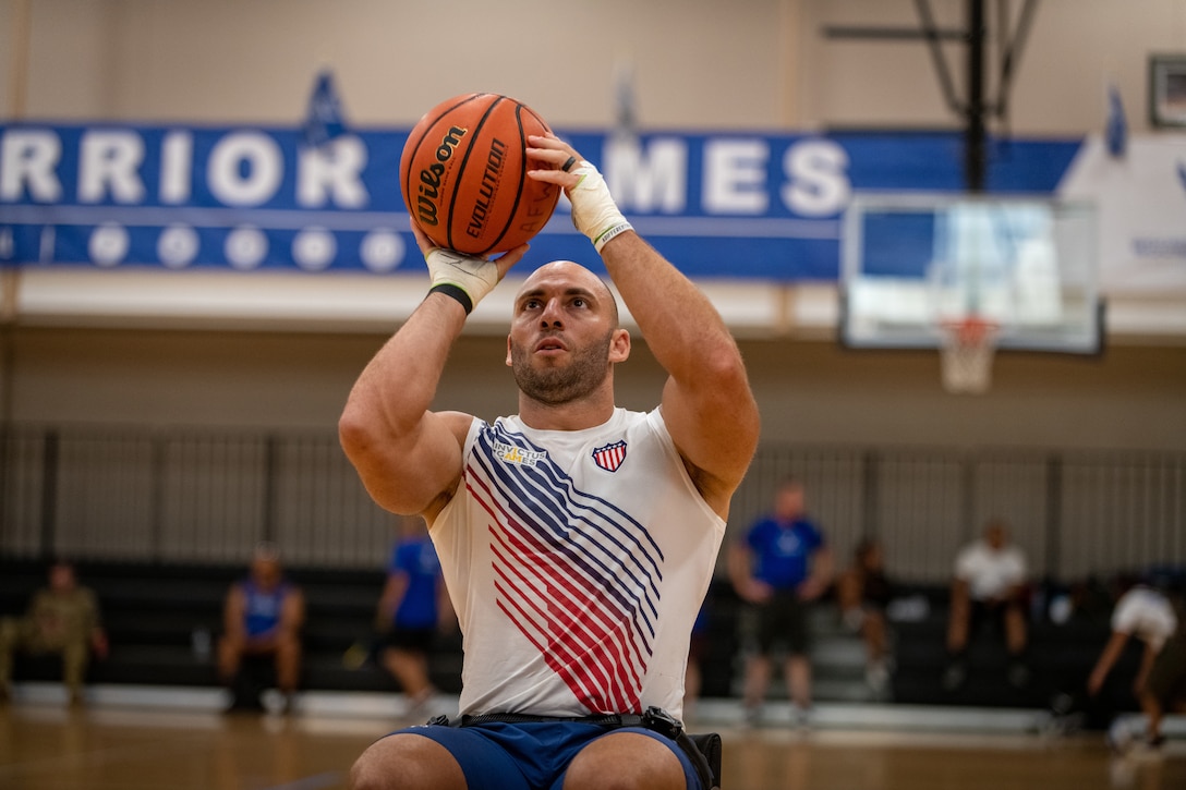 An airman practices taking a shot.