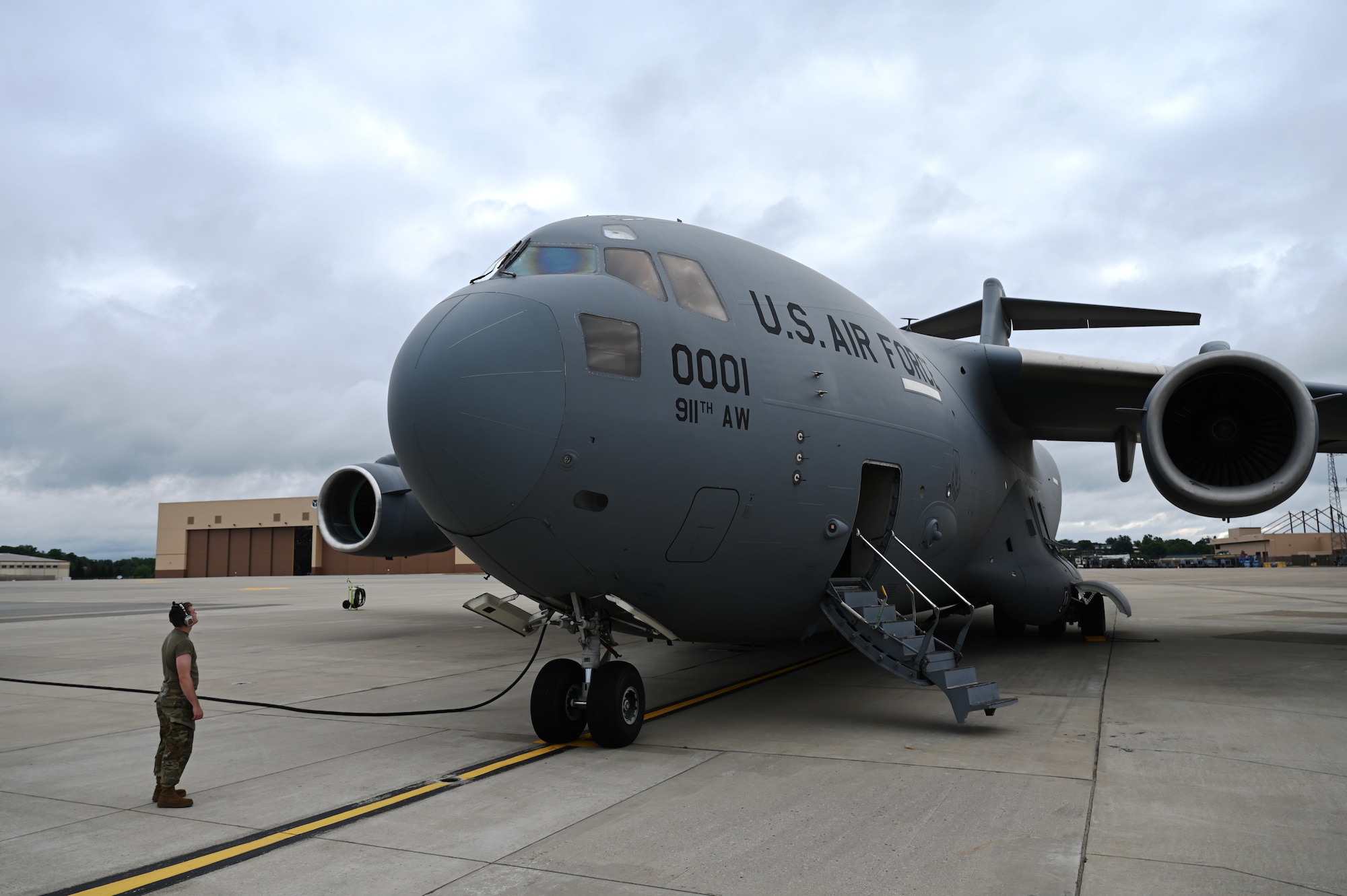 Airman Brandon Parker, 911th Aircraft Maintenance Squadron crew chief, conducts a pre-flight inspection on a C-17 Globemaster III the Pittsburgh International Airport Air Reserve Station, Pennsylvania, June 9, 2022.