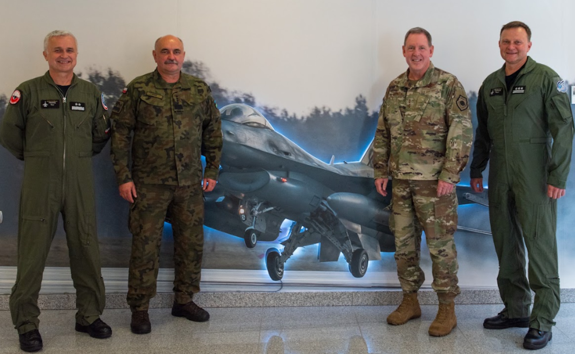 U.S. Air Force Gen. James Hecker, U.S. Air Forces in Europe and Air Forces Africa commander, visited the 32nd Tactical Air Base in Łask, Poland, to welcome 12 U.S. Air Force F-22 Raptors forward deploying from the 90th Fighter Squadron at Joint Base Elmendorf-Richardson, Alaska, Aug. 5, 2022. The Raptor is a critical component of the global strike Task Force, and is designed to project air dominance, rapidly and at great distances to defeat threats.  (U.S. Air Force photo by Staff Sergeant Danielle Suhklull)