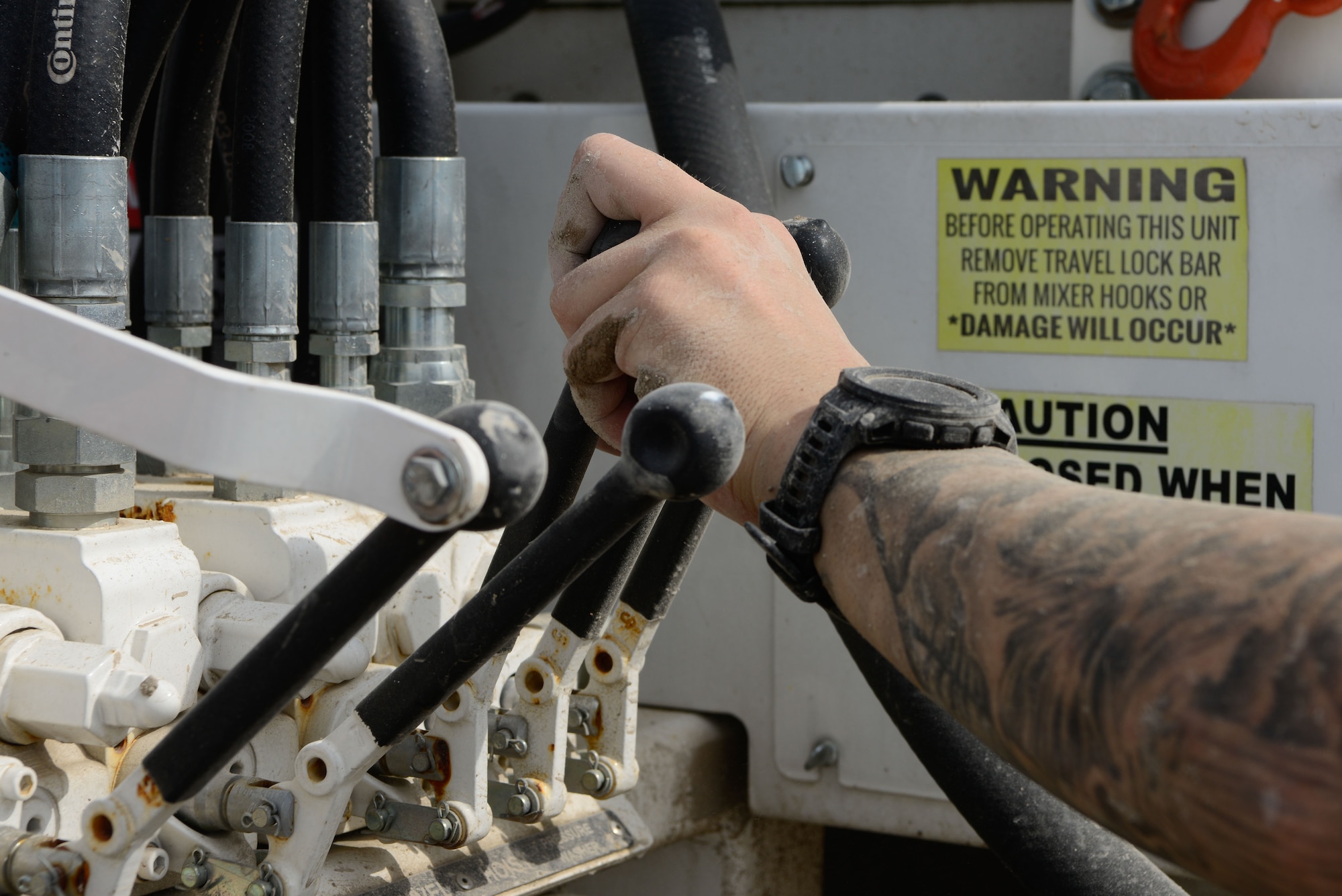 U.S. Air Force Staff Sgt. Jacob Martin, 31st Civil Engineer Squadron pavements and heavy equipment operator journeyman, operates a concrete truck at Aviano Air Base, Italy, July 27, 2022. As a member of the 31st CES’s “Dirt Boyz” section, Martin is responsible for any CE project that involves construction and repair on runways, roads, sidewalks and more. (U.S. Air Force photo by Airman 1st Class Thomas Calopedis)