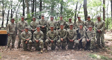 New Hampshire Guardsmen pose at a Governor’s Twenty awards presentation during a ceremony at the NHNG Combat Marksmanship Match on July 30, 2022, at Fort Devens, Mass.